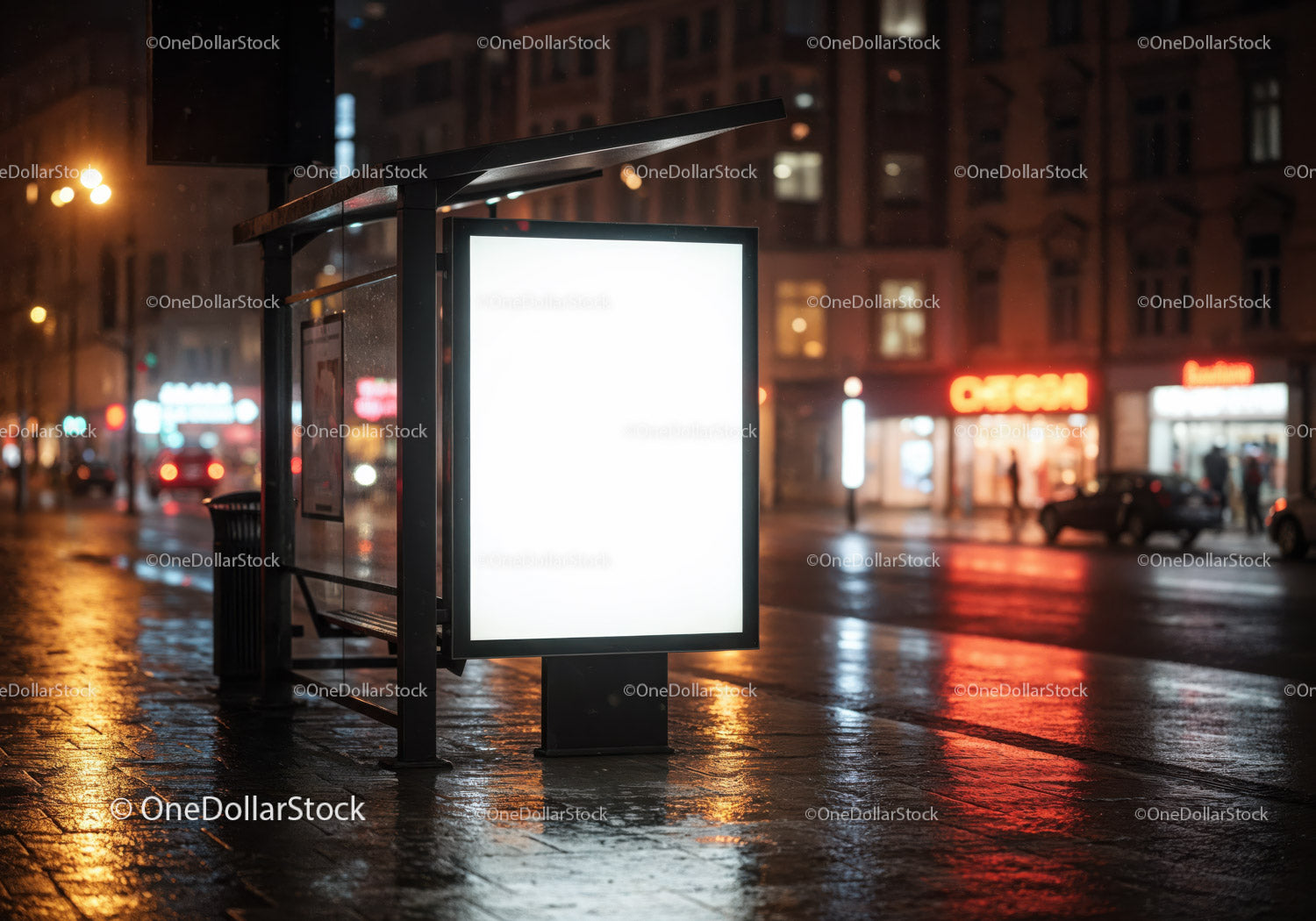 Nighttime Bus Stop Shelter with Lighted Billboard on Wet City Street