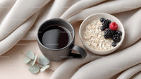 Coffee and Oatmeal with Berries on Cozy Fabric Background