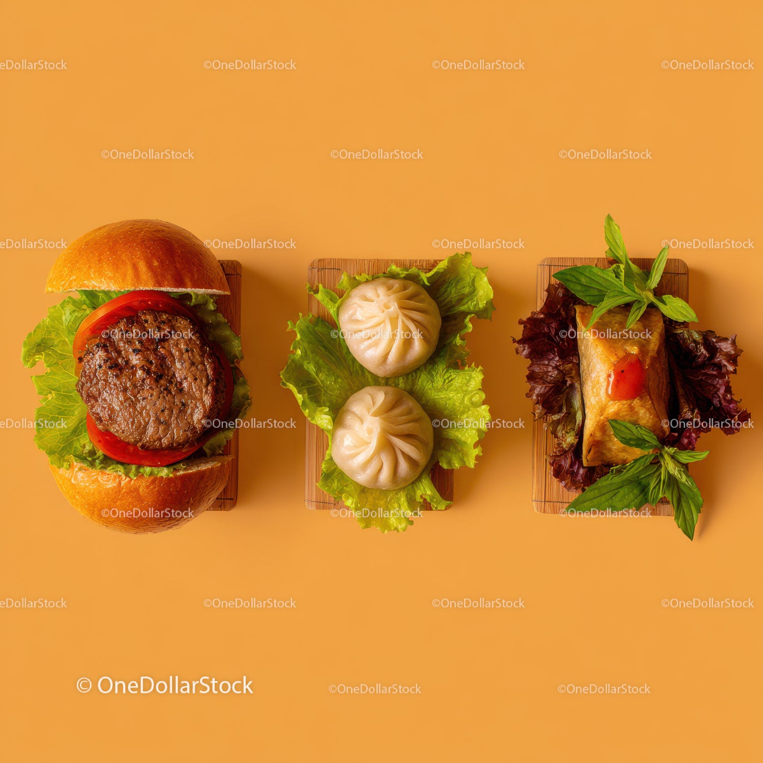 Gourmet Burger with Lettuce and Tomato Next to Grilled Steak and Dumpling