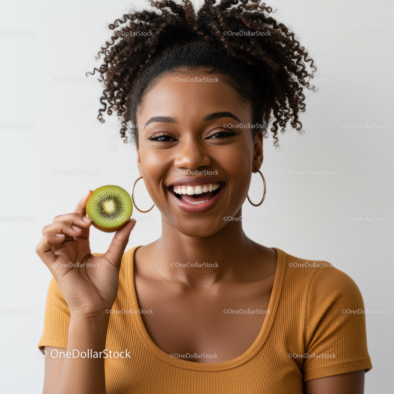 Portrait of Smiling Woman Holding Kiwi Fruit with Natural Background