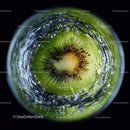 Close-Up of Juicy Green Kiwi Slices with Water Splash