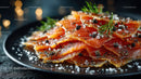 Fresh Smoked Salmon Slices with Dill on Dark Plate for Gourmet Seafood