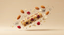 Nutty berry granola bar with floating ingredients