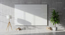 Minimalist Living Room with Blank Canvas Wall Art and Green Plant