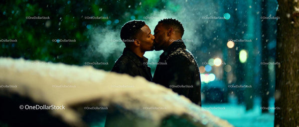 Couple Sharing a Tender Winter Kiss Outdoors