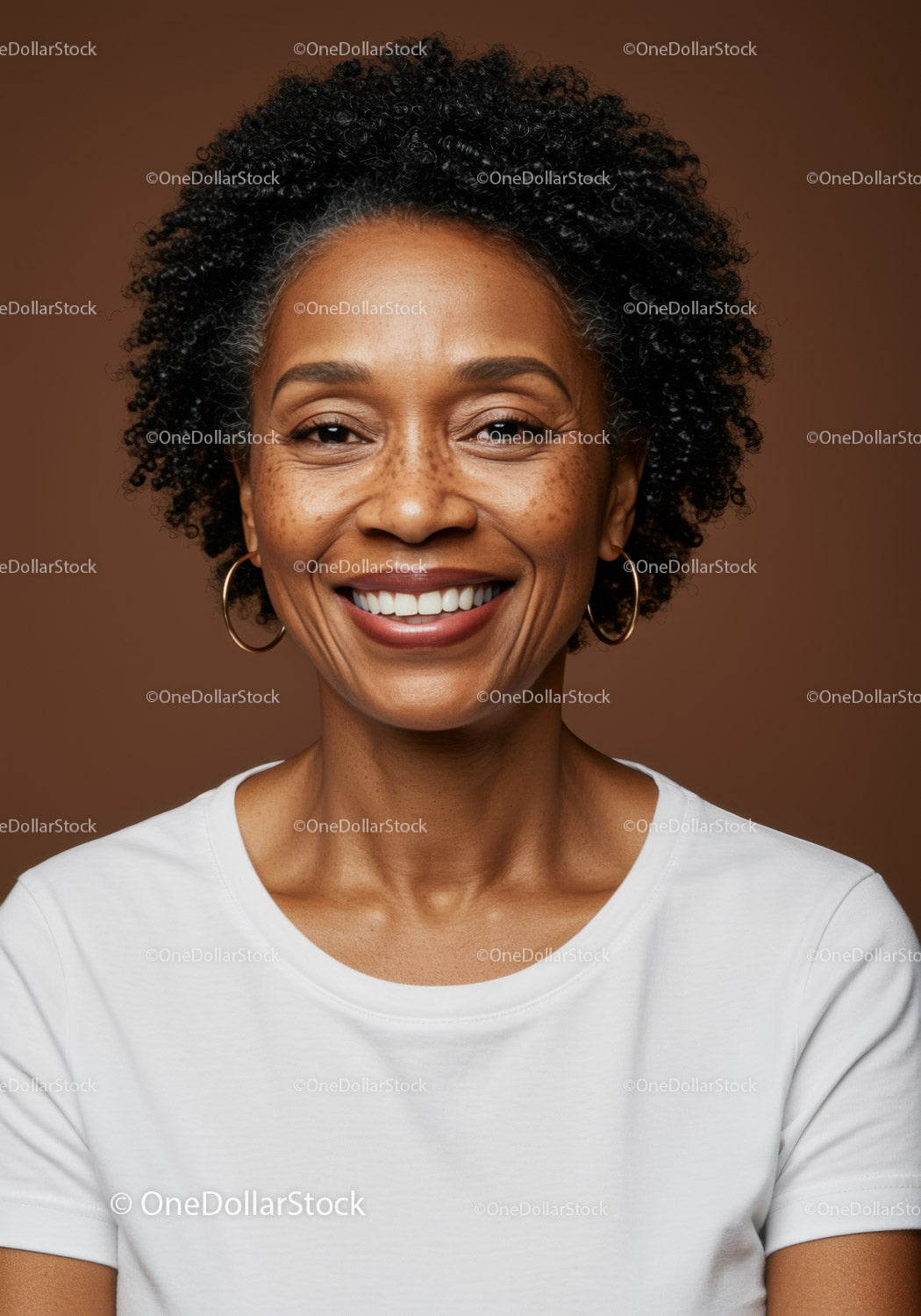 Confident Smiling Woman with Curly Hair and Hoop Earrings