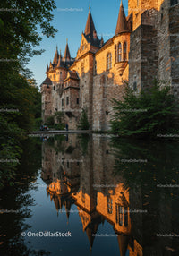Historic Medieval Castle with Turrets Reflecting in Water