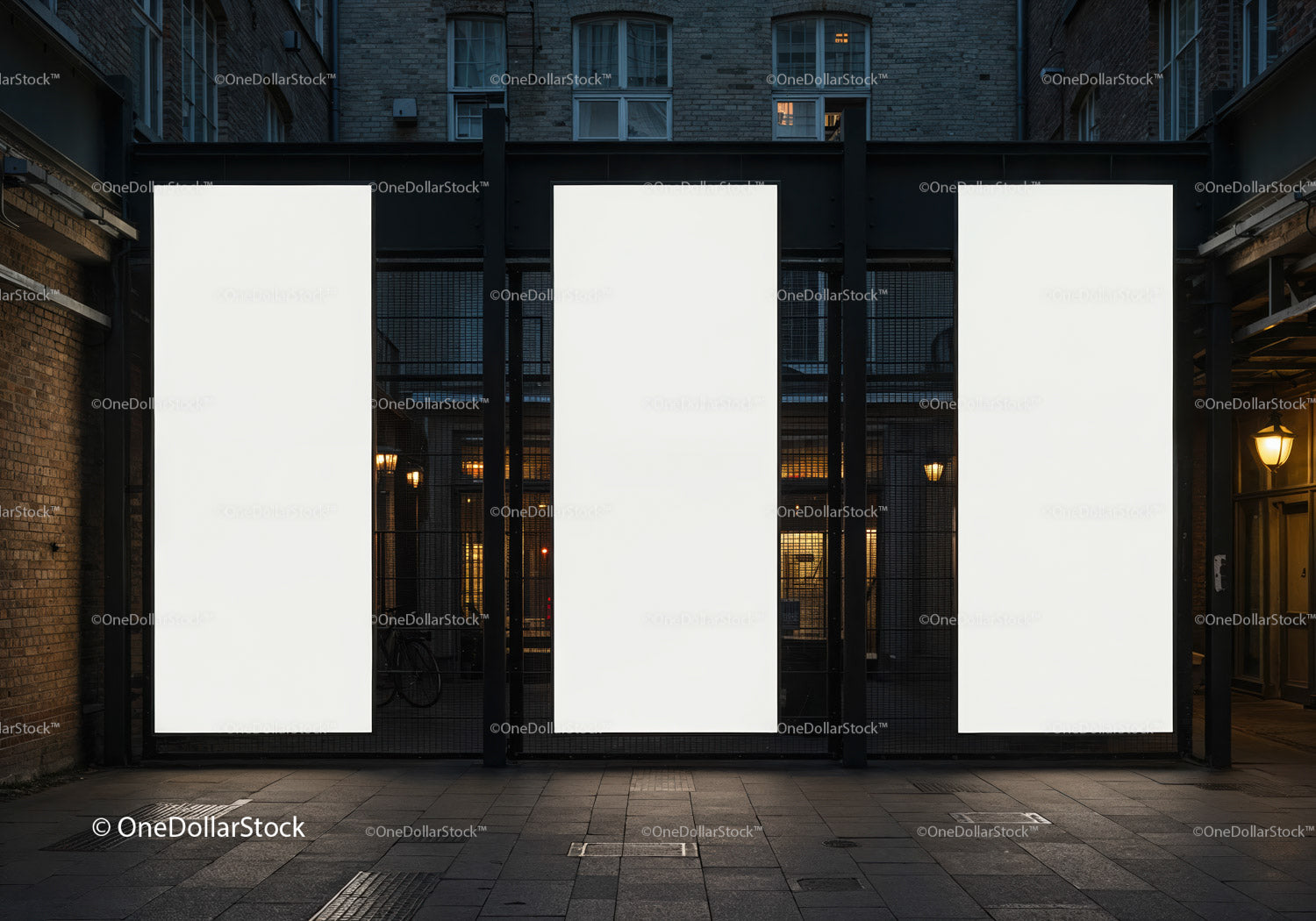 Three blank vertical billboards in urban night setting