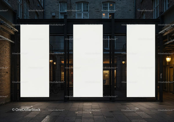Three blank vertical billboards in urban night setting JPG Mockup Image