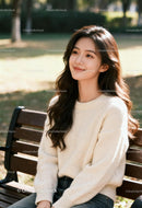 Young woman enjoying peaceful moment on park bench
