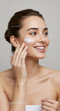 Young Woman Applying Moisturizer for Flawless Skin