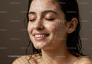 Young Woman with Facial Exfoliating Mask and Relaxed Smile