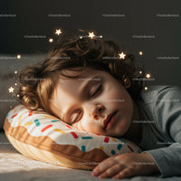 Sleeping child resting peacefully on colorful donut pillow