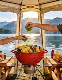 Fresh seafood boil cooking by lake at sunset