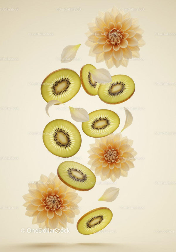 Fresh sliced kiwi with soft pastel flowers and petals