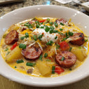 Hearty Sausage and Potato Stew with Vegetables and Egg