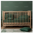 Wooden Crib with Green Bedding in Contemporary Nursery
