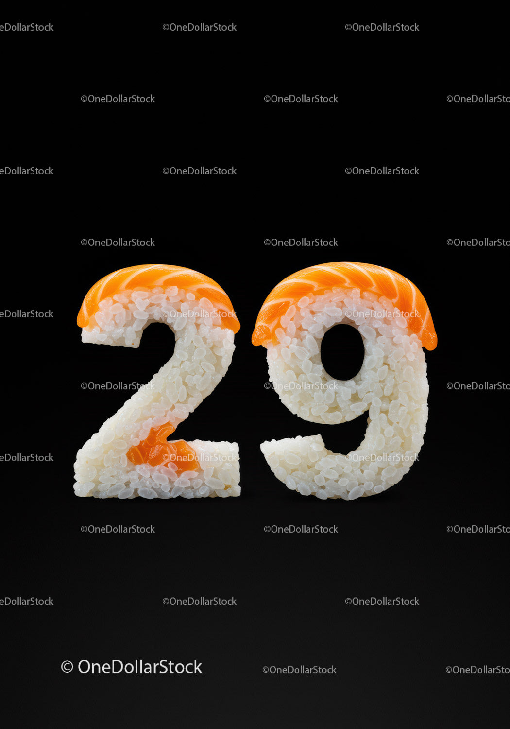 Kreatywne sushi w kształcie cyfry dwadzieścia dziewięć na czarnym tle