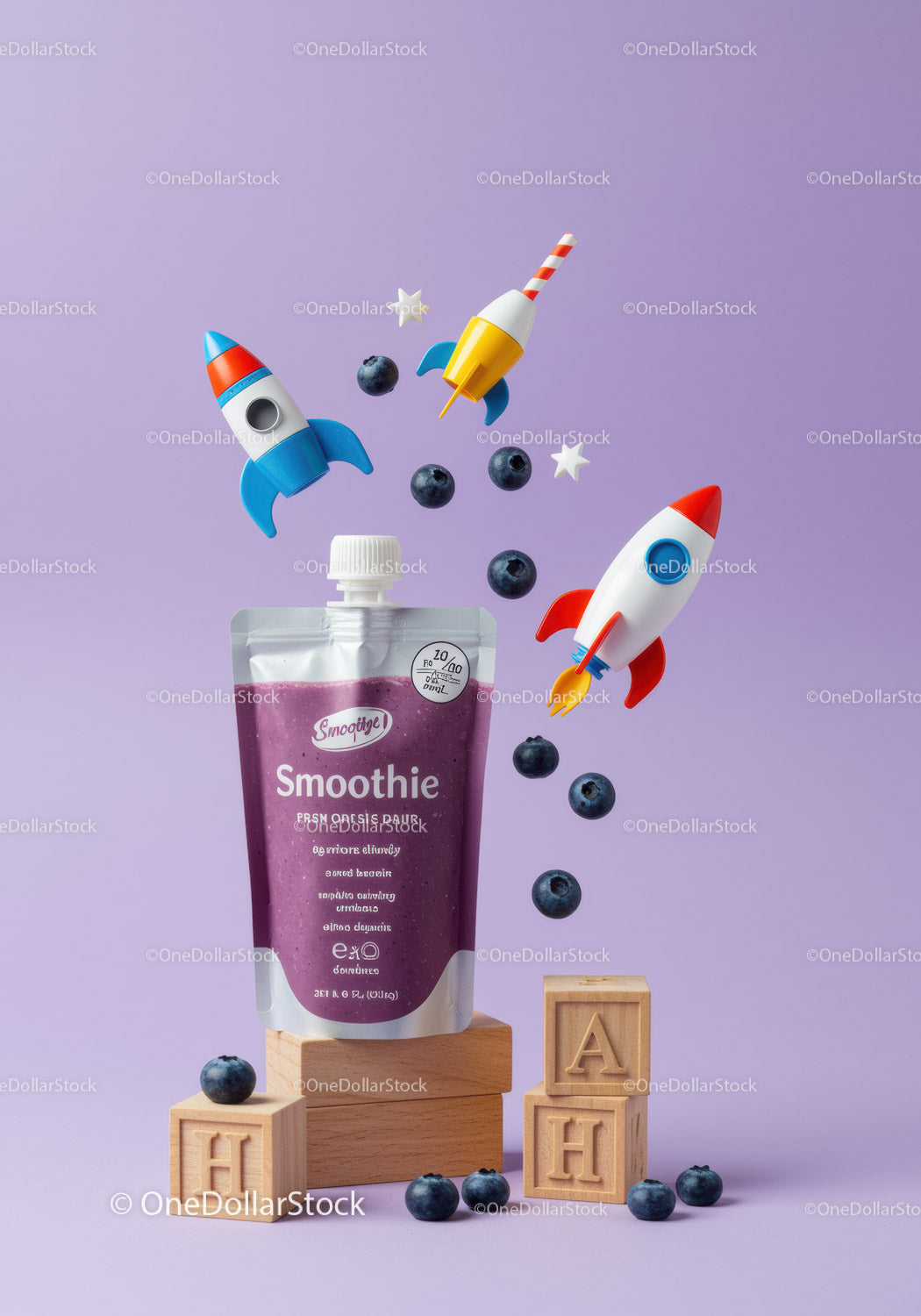 Blueberry Smoothie with Playful Rocket Toys and Wooden Blocks