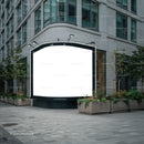 Blank street billboard next to modern office building