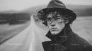 Black and White Portrait of Young Man with Windy Rainy Outdoors
