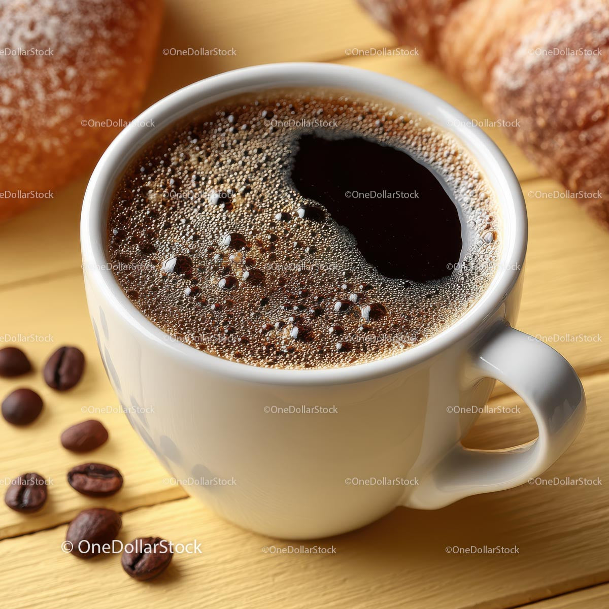 Close-up of Fresh Coffee in a White Cup with Pastries
