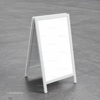 Blank White Sandwich Board on Concrete Pavement