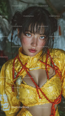 Vivid Portrait of a Woman in Yellow Dress with Red Rope