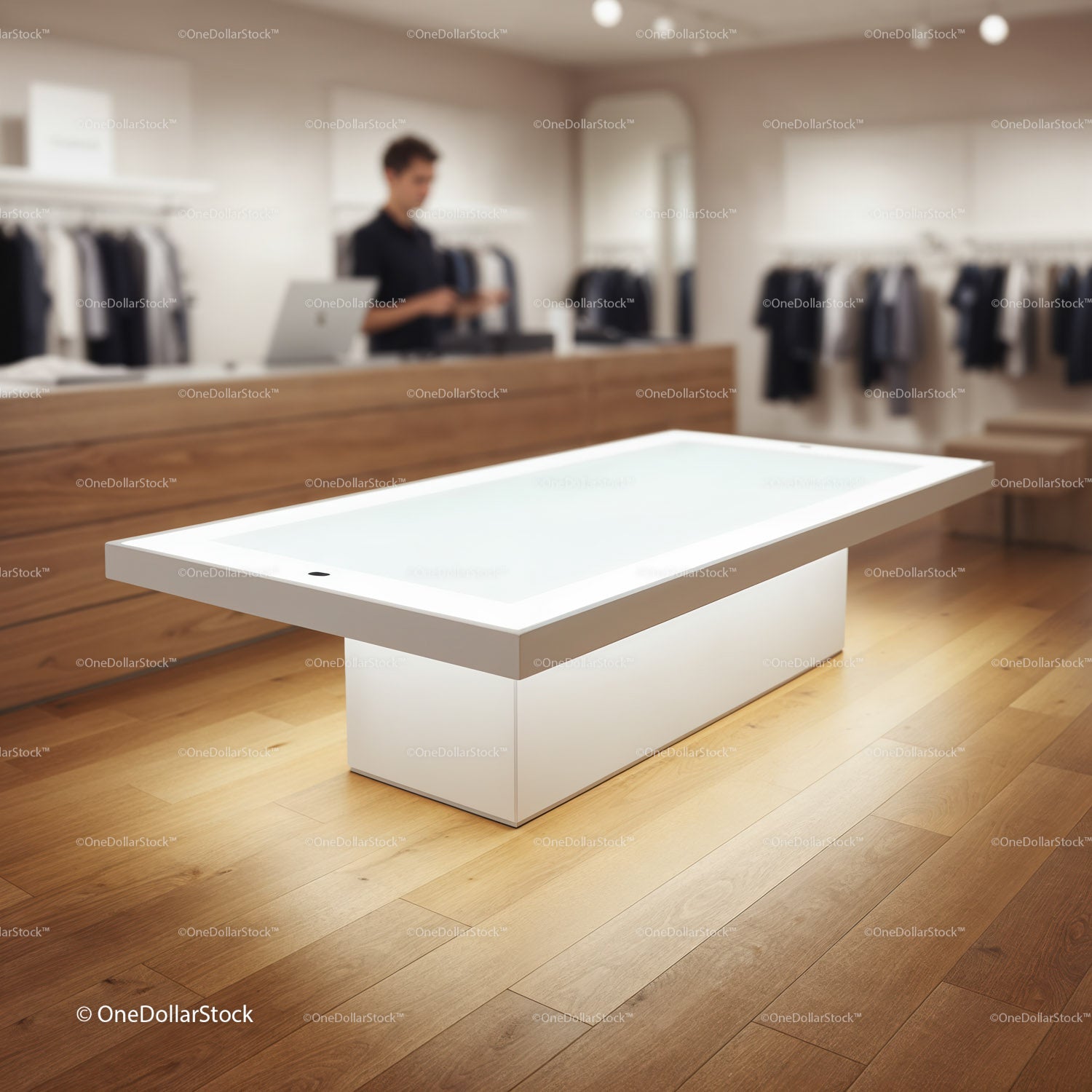 Modern interactive table in stylish clothing store interior