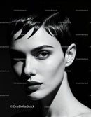 Close-up portrait of confident woman with short hair