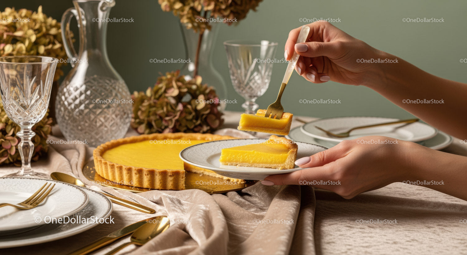 Elegant Lemon Tart on a Stylish Table with Crystal Glassware and Flowers