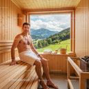 Relaxing Man in Wooden Sauna with Scenic Mountain View