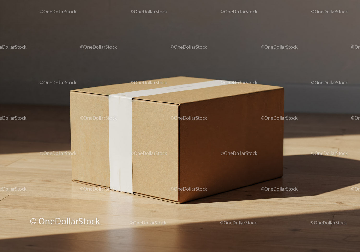 Minimalist cardboard box with white tape on wooden floor