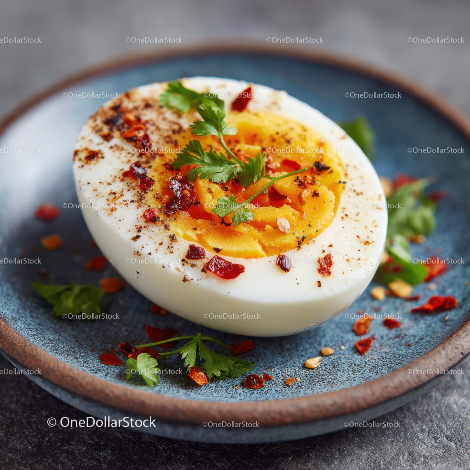 Hard Boiled Egg with Spices on Rustic Blue Plate for Healthy Breakfast