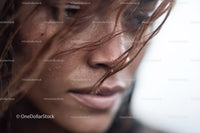 Close-up of a Woman's Face with Natural Skin and Wet Hair