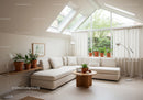 Bright modern living room with plants and skylight window