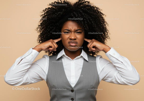 Confused Woman Covering Ears Expressing Stress and Frustration