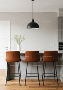 Modern Kitchen with Leather Bar Stools and Black Pendant Light