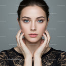 Portrait of a Beautiful Woman with Blue Eyes and Glamorous Makeup