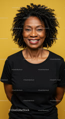 Confident Smiling Woman with Curly Hair Vibrant Yellow Background