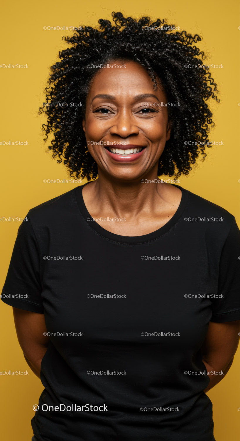 Confident Smiling Woman with Curly Hair Vibrant Yellow Background