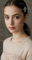 Elegant Young Woman with Pearl Hair Clip and Brown Eyes