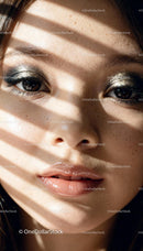 Close-up portrait of woman with glittery eye makeup