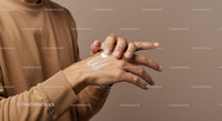 Close-Up of Hands Applying Lotion for Moisturizing Skin