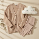 Cozy beige cardigan with leggings and cloud pillow