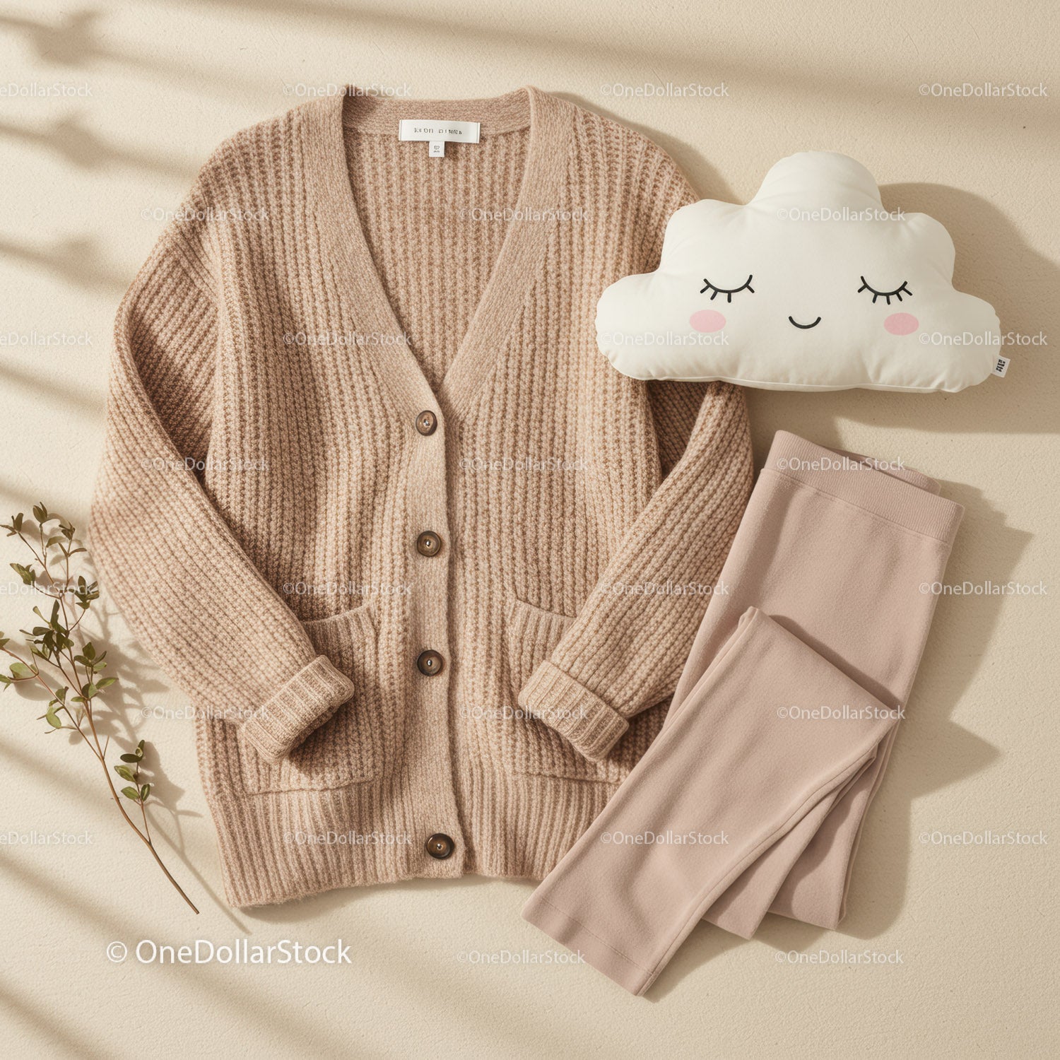 Cozy beige cardigan with leggings and cloud pillow