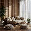 Cozy rattan daybed with cushions in bright modern room