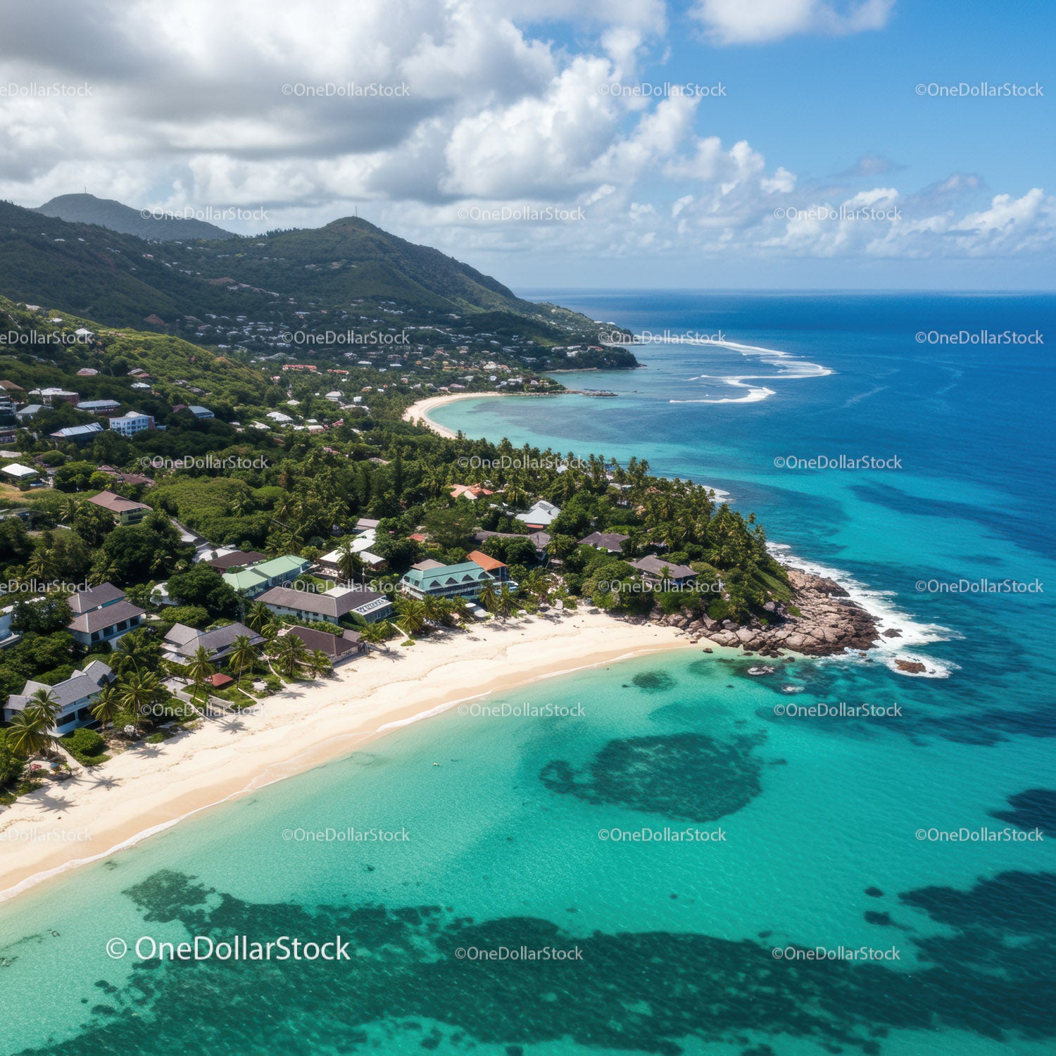 Beautiful Tropical Beach with Clear Waters and Mountain Backdrop