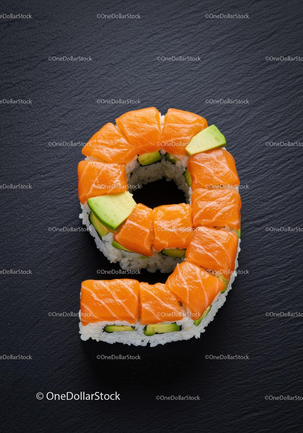 Number nine shaped sushi roll with salmon and avocado