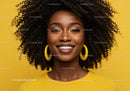 Beautiful Smiling African American Woman with Curly Hair and Yellow Earrings